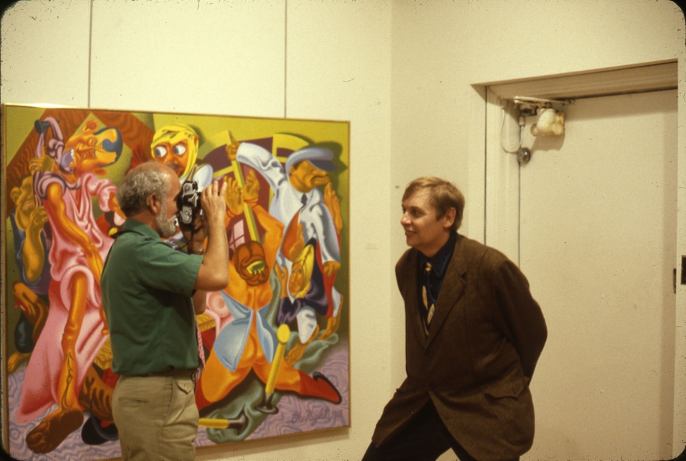 Robert Arneson and Jack Beal in front of Peter Saul&amp;rsquo;s Beckmann&amp;rsquo;s &amp;lsquo;The Night, 1918&amp;rsquo;, May 1979.

Image courtesy the George Adams Gallery Archives.