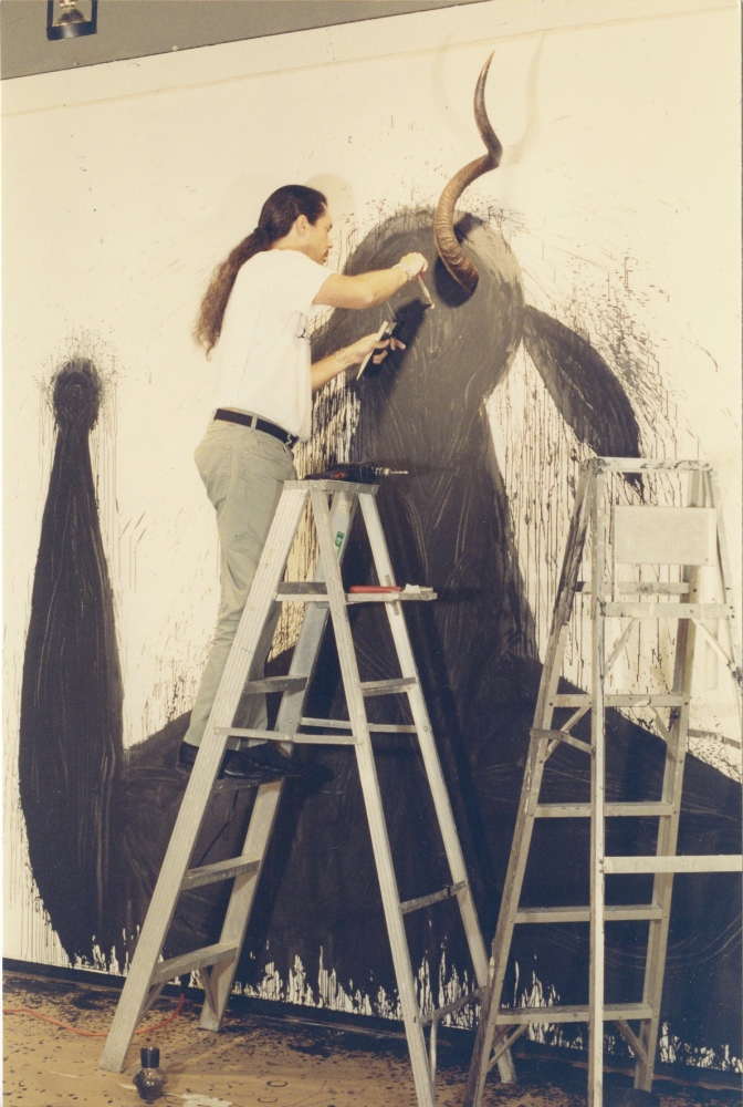 Jose Bedia working on his installation 'Bilongo Negro'